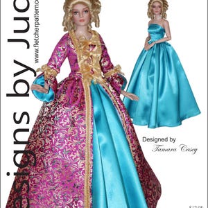 May include: A doll in a Regal Court gown, featuring a magenta and gold brocade bodice and a turquoise skirt. Another doll is shown in a turquoise ball gown. The image includes text that reads "Designs by Jude" and "VDC Club Grace".
