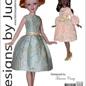 May include: Two fashion dolls, one with red hair in a blue dress with gold accents, and the other with dark hair in a pink dress. The text "Friends for 16" Ellowyne Dolls" is visible.