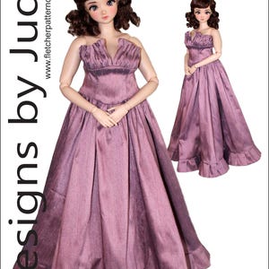 May include: A doll wearing a mauve-colored gown with a V-neck bodice and a full skirt. The dress is designed for a 60cm Pear Smart Doll. The image includes the text "Dance with Me" and "Designs by Jude".