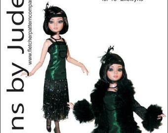 May include: A sewing pattern for a 16-inch doll, featuring a black and green flapper dress with fringe and sequins. The pattern is titled "Roaring Twenties" and is designed by Tamara Casey.