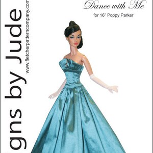 May include: A teal blue ball gown with a ruffled hem, designed for a 16-inch Poppy Parker doll. The dress has a strapless bodice with a gathered detail and is made of a shiny fabric. The pattern is titled "Dance with Me" and includes a barcode and price tag.