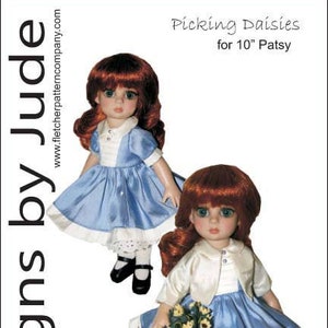 May include: A sewing pattern for a blue dress and white cardigan for a 10-inch Patsy doll. The pattern is called "Picking Daisies" and is by Designs by Jude.