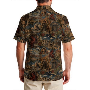 May include: Short-sleeved button-down shirt with a vintage western-themed print. The design features illustrations of cowboys, desert landscapes, and vintage portraits in shades of brown, blue, and tan.