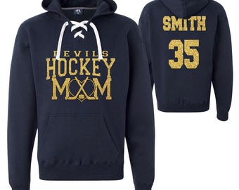 Sweat-shirt à capuche sport unisexe en dentelle avec paillettes personnalisées pour maman de l'équipe de hockey par J. America Sweat à capuche Hockey Mama - 8830