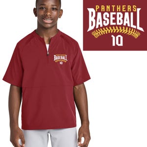 May include: A maroon baseball jacket with short sleeves and a quarter-zip closure. The jacket features the text "Panthers Baseball" in white and gold, with the number 10. The jacket is worn by a person.