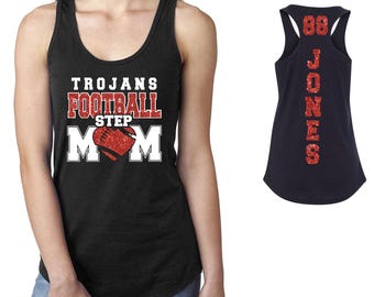 May include: Black tank top featuring the text "TROJANS FOOTBALL STEP MOM" in white and red glitter, and a red glitter football graphic. The back displays the number "88" and the name "JONES" in red glitter.