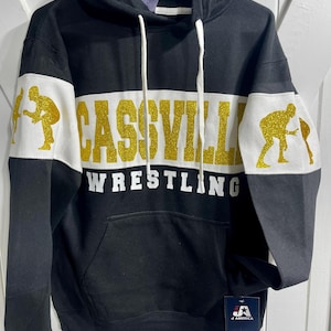 Neue völlig kundenspezifische personalisierte Wrestling Glitter Design Colorblock Varsity Fleece J America Kapuzenpullover Sweatshirt - 8644.nvy / ogld
