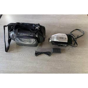 Videocámara Panasonic PV-L354D Palmcorder VHS-C con bolsa, cargador y batería PROBADA