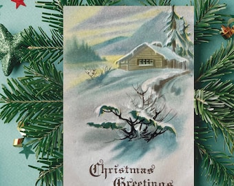 ヴィンテージの雪のクリスマスカード、パステルカラーの冬のキャビンプリント
