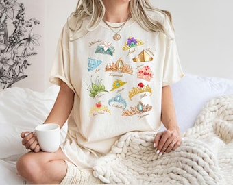 Comfort Colors Watercolor Coquette Disney Princess Crowns Shirt, Disney Aurora Ariel Belle Cinderella Tiana Tee, Magic Kingdom Disneyland