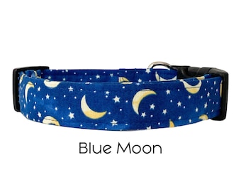 May include: Blue dog collar with a blue moon and stars pattern. The text "Blue Moon" is printed below the collar.