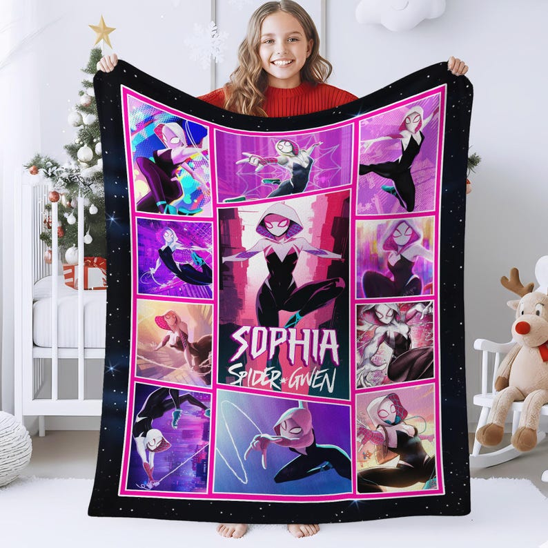 May include: A black blanket featuring a grid of Spider-Gwen illustrations in various action poses, set against a vibrant pink and purple backdrop. The blanket has a black border with white star accents and the name "SOPHIA" and "SPIDER-GWEN" in the center.