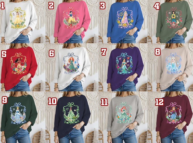 Puede incluir: Colecci&oacute;n de sudaderas de cuello redondo en varios colores, cada una con un gr&aacute;fico de princesa diferente dentro de un marco decorativo. Los colores incluyen blanco, rosa, azul, verde, rojo, morado y gris. Los dise&ntilde;os de princesas est&aacute;n rodeados de elementos florales.