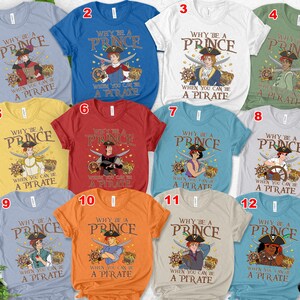 May include: A collection of crew neck t-shirts in various colors, each featuring a pirate-themed graphic. The design includes a pirate character, swords, a ship's wheel, and the text "Why be a Prince When You Can be a Pirate."