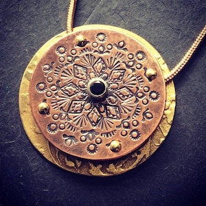 Stamped Mixed Metal Copper and Brass Mandala Pendant with black Cubic Zirconia