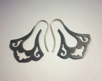 Blackened copper and Argentium silver blade earrings with damask cutouts