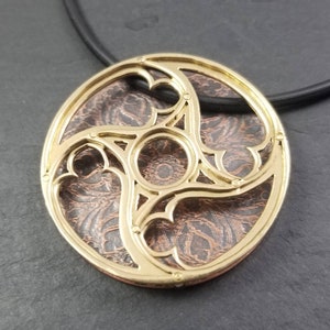 Layered mixed metal brass and copper cathedral window gothic pendant