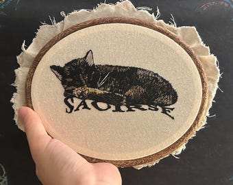 Custom hand-embroidered cat portraits