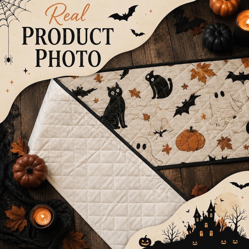 May include: A quilted table runner featuring a cream-coloured fabric with a repeating pattern of black cats, orange pumpkins, white ghosts, bats, and brown autumn leaves. The runner has a diamond-stitched texture and a solid cream-coloured underside.