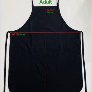 May include: Black adult apron with a front pocket. The apron's height is 80cm (31.5 inches) and width is 65cm (25.6 inches). The apron has a neck loop and waist ties. The word "Adult" is printed at the top of the apron.