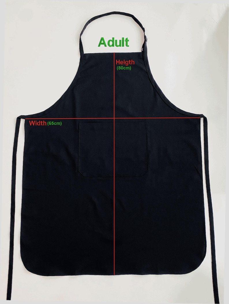 May include: Black adult apron with a front pocket. The apron's height is 80cm (31.5 inches) and width is 65cm (25.6 inches). The apron has a neck loop and waist ties. The word "Adult" is printed at the top of the apron.