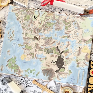 May include: A detailed fantasy map with landmasses, bodies of water, and geographical features. The map is surrounded by decorative items like a compass, magnifying glasses, and a wooden sword. The map has the text "Waste Lands" and "The Great Sea".