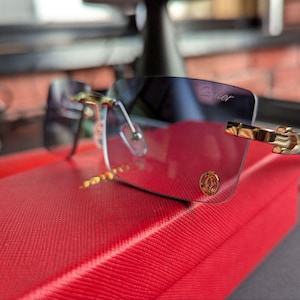 Lunettes de soleil Cartier Luxury Rimless