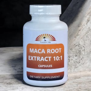 May include: A white plastic bottle of Maca Root Extract 10:1 capsules. The label features the brand name "Natures Isle" above the text "MACA ROOT EXTRACT 10:1 CAPSULES" and "DIETARY SUPPLEMENT". The bottle has a white cap.