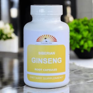 May include: A white bottle of "Siberian Ginseng Root Capsules" dietary supplement. The label features the "Natures Isle" logo and a yellow background with the product name in large, bold letters. The bottle has a white cap.