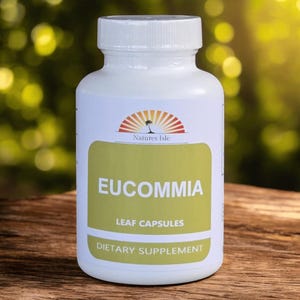 May include: A white bottle of "EUCOMMIA LEAF CAPSULES" dietary supplement. The label features a logo with a palm tree and the words "Natures Isle". The bottle has a white cap and is set against a blurred green background.
