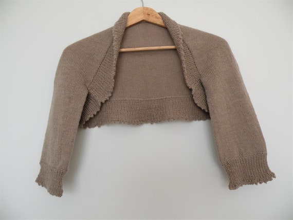 Shrug fashion sales