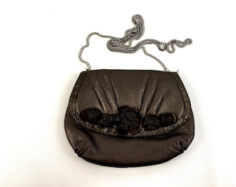 Brighton Velvet Rose Pouch Purse Done In A Metallic Brown Color With A Detachable Shoulder Strap