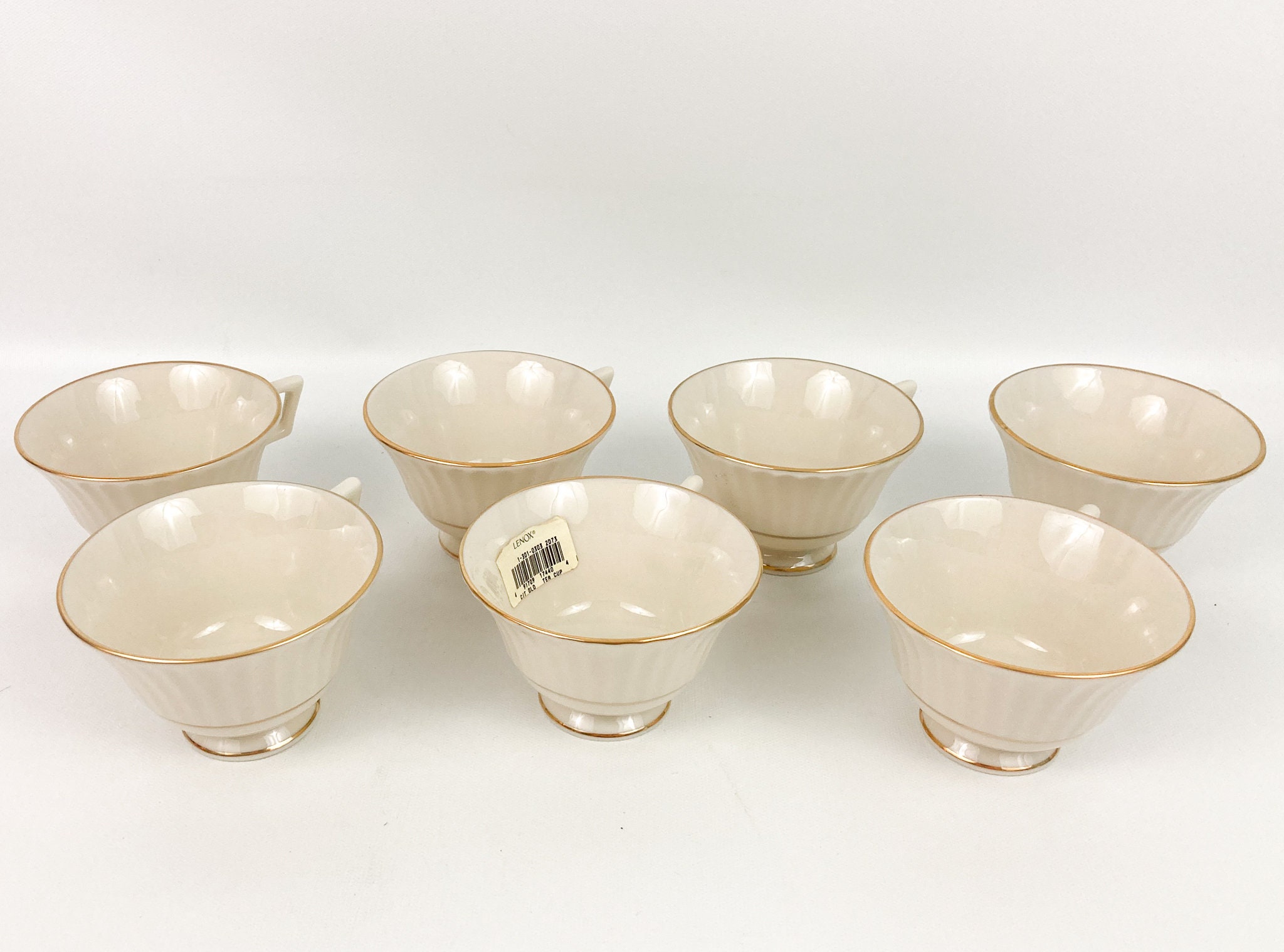 Vintage Lenox Citation Gold Tea Cups (7) Temple Collection  Ribbed Design Against An Ivory Porcelain Gold Trim