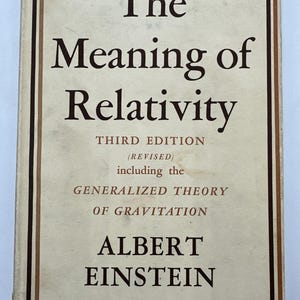 May include: A vintage book titled "The Meaning of Relativity" by Albert Einstein. The book is a third edition, revised to include the generalized theory of gravitation.