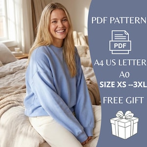 May include: A woman wearing a light blue sweatshirt and white pants. The image includes text that reads "PDF PATTERN", "A4 US LETTER", "SIZE XS --3XL", and "FREE GIFT".