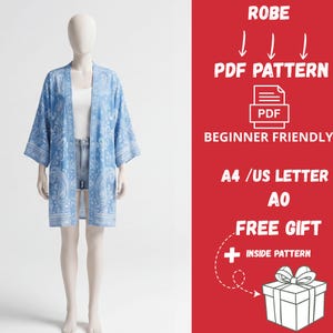 May include: A light blue robe with a white paisley design is displayed on a mannequin. The robe is open-fronted with three-quarter sleeves. Text on the right side of the image reads "ROBE PDF PATTERN BEGINNER FRIENDLY A4/US LETTER AO FREE GIFT INSIDE PATTERN."