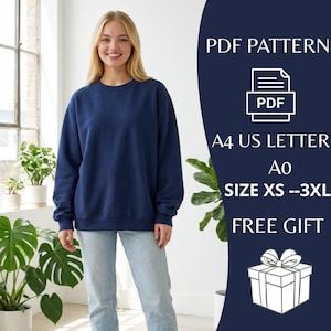 May include: A woman wearing a navy blue sweatshirt and light blue jeans. The image includes text that says "PDF PATTERN", "A4 US LETTER", "SIZE XS --3XL", and "FREE GIFT". The background includes plants and a window.