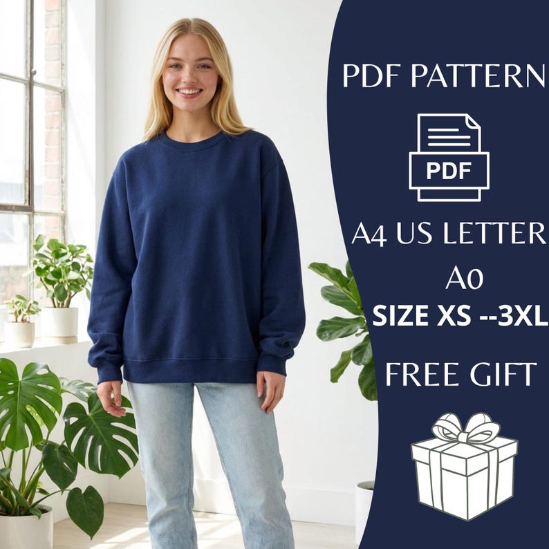 May include: A woman wearing a navy blue sweatshirt and light blue jeans. The image includes text that says "PDF PATTERN", "A4 US LETTER", "SIZE XS --3XL", and "FREE GIFT". The background includes plants and a window.