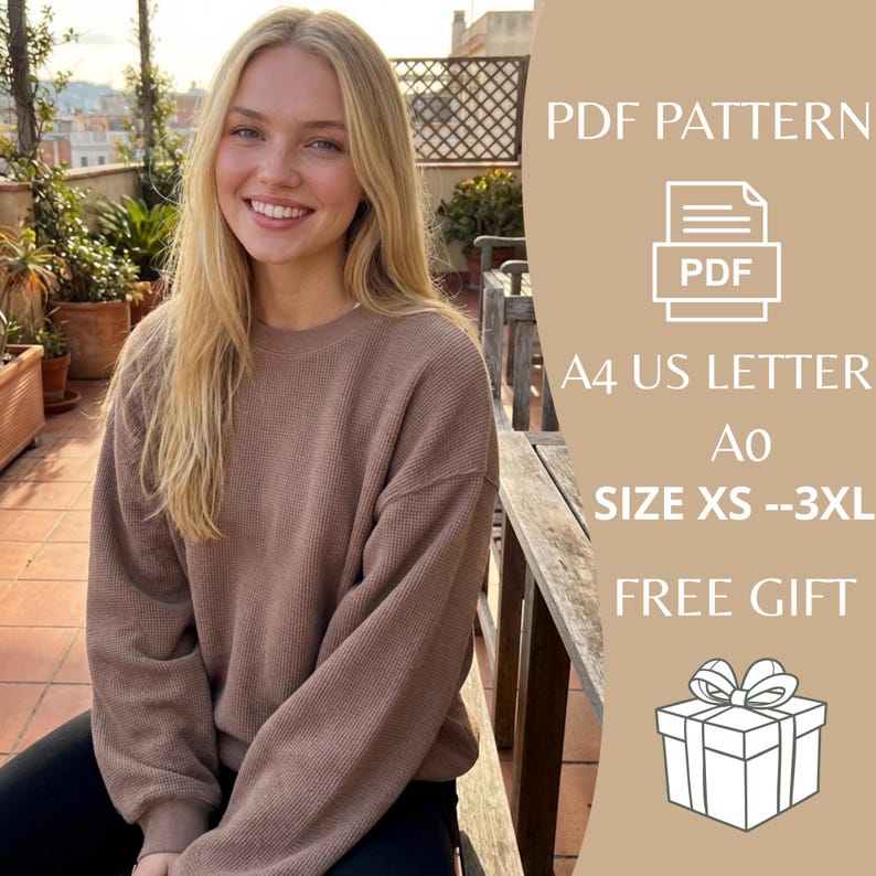 May include: A woman wearing a brown waffle-knit sweater. The image includes text that reads "PDF PATTERN", "A4 US LETTER", "SIZE XS --3XL", and "FREE GIFT". A gift box graphic is also present.