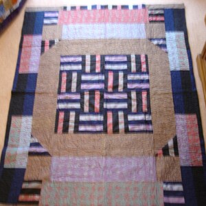 Patchwork quilt darker colours.