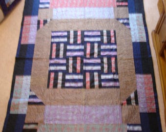Patchwork quilt darker colours.