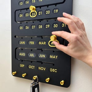 Perpetual Wood Wall Calendar with Key Hooks, Interactive Home Decor, Black and Gold, Wooden Wall Hanging, Modern Feature for Home or Office