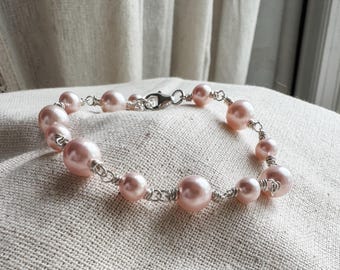 Pulsera de perlas rosas hecha a mano, de plata de ley o chapada en oro.