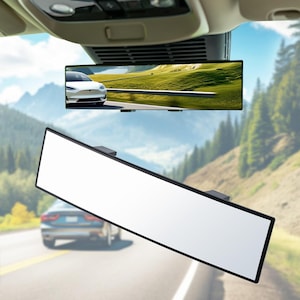 May include: A wide-angle rearview mirror for cars. The mirror is curved and has a black frame. It is designed to provide a wider view of the road behind the car.