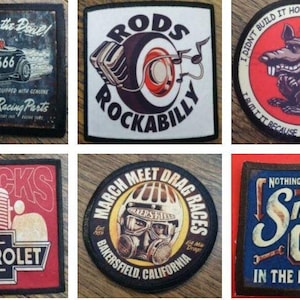 May include: Nine embroidered patches with a vintage car, truck, and motorcycle theme. The patches feature a red truck with the text "Trucks Chevrolet", a red and white car with the text "Racing with the Devil! 666", a red and white car with the text "Rods Rockabilly", a red and white car with the text "March Meet Drag Races Bakersfield, California", a red and white rat with the text "I didn't build it hoping for your approval... I built it because it meets mine", and a blue and yellow patch with the text "Nothing like the Smell of Oil in the Morning".