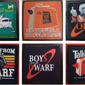 May include: Six colourful fabric patches with various designs. The patches feature a spaceship, a toaster, a waffle iron, and the text "Boys from the Dwarf" in different styles.