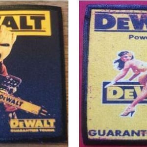May include: Two Dewalt brand patches. The first patch features a cartoon character holding a chainsaw with the text "DEWALT GUARANTEED TOUGH". The second patch features a pin-up style woman with the text "DEWALT Power Tools GUARANTEED TOUGH."