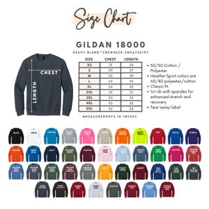May include: A Gildan 18000 Heavy Blend crewneck sweatshirt size chart with a visual guide showing chest and length measurements in inches. The chart lists sizes XS through 5XL with corresponding dimensions and includes a color palette of 40 different sweatshirt options.