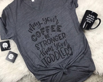 May Your Coffee Be Stronger Than Your Toddler Mom Life Motherhood Funny Trendy Mama Tee Or Tank Women's Xs to Plus Size 4XL Stylish Relaxed