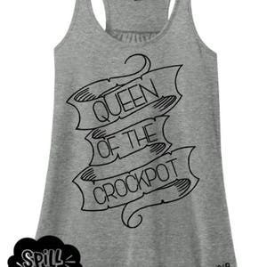 May include: Grey tank top with a black graphic that says "Queen of the Crockpot" in a banner style font.